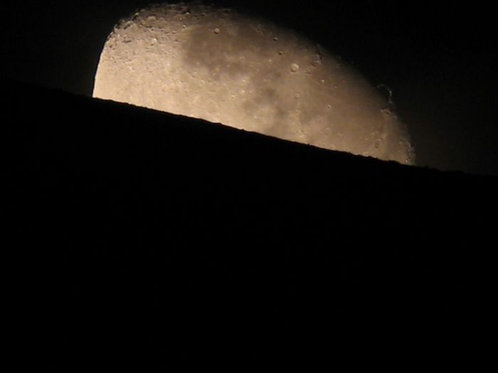 moon behind the mountain